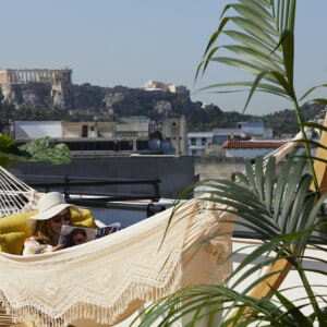 Brown-Acropol-Athens-Rooftop-Hammock-Guest-Relaxing